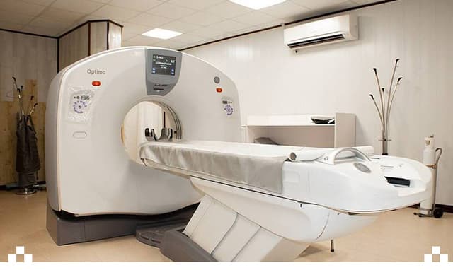 Installation and commissioning of the CT‑128 device in the imaging department of Razavi Hospital.